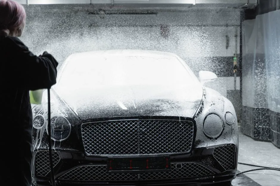 Mercedes covered in thick white foam during an exterior wash